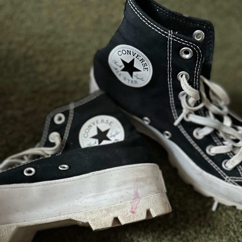 High top. Thick sole. Converse black